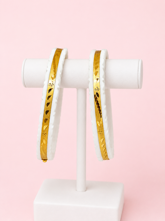 Product Name: Path Shakha Pair
Quantity: 2 Pieces (1 Pair)
Color: White & Gold
Design: Traditional Bengali Path Shakha
Finish: Premium Gold-Plated Detailing
Style: Ethnic & Traditional
Occasion: Daily Wear, Puja, Wedding, Festive Wear
Lightweight & Comfortable Fit