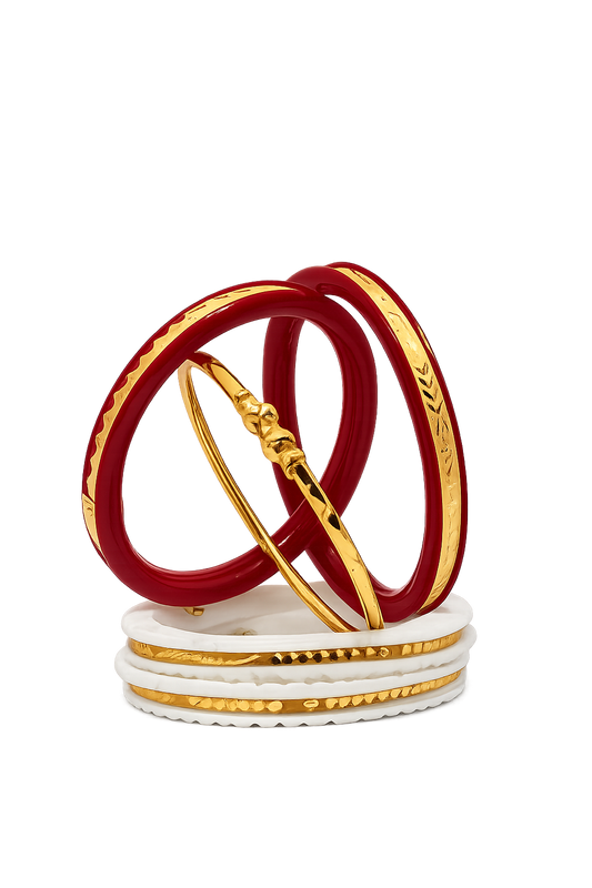 Featuring beautifully engraved gold-plated bangles, classic red Shakha-inspired bangles, elegant white Pola-style bangles, and a matching Noya bracelet, this combo is perfect for weddings, festivals, puja, anniversaries, and daily traditional wear.