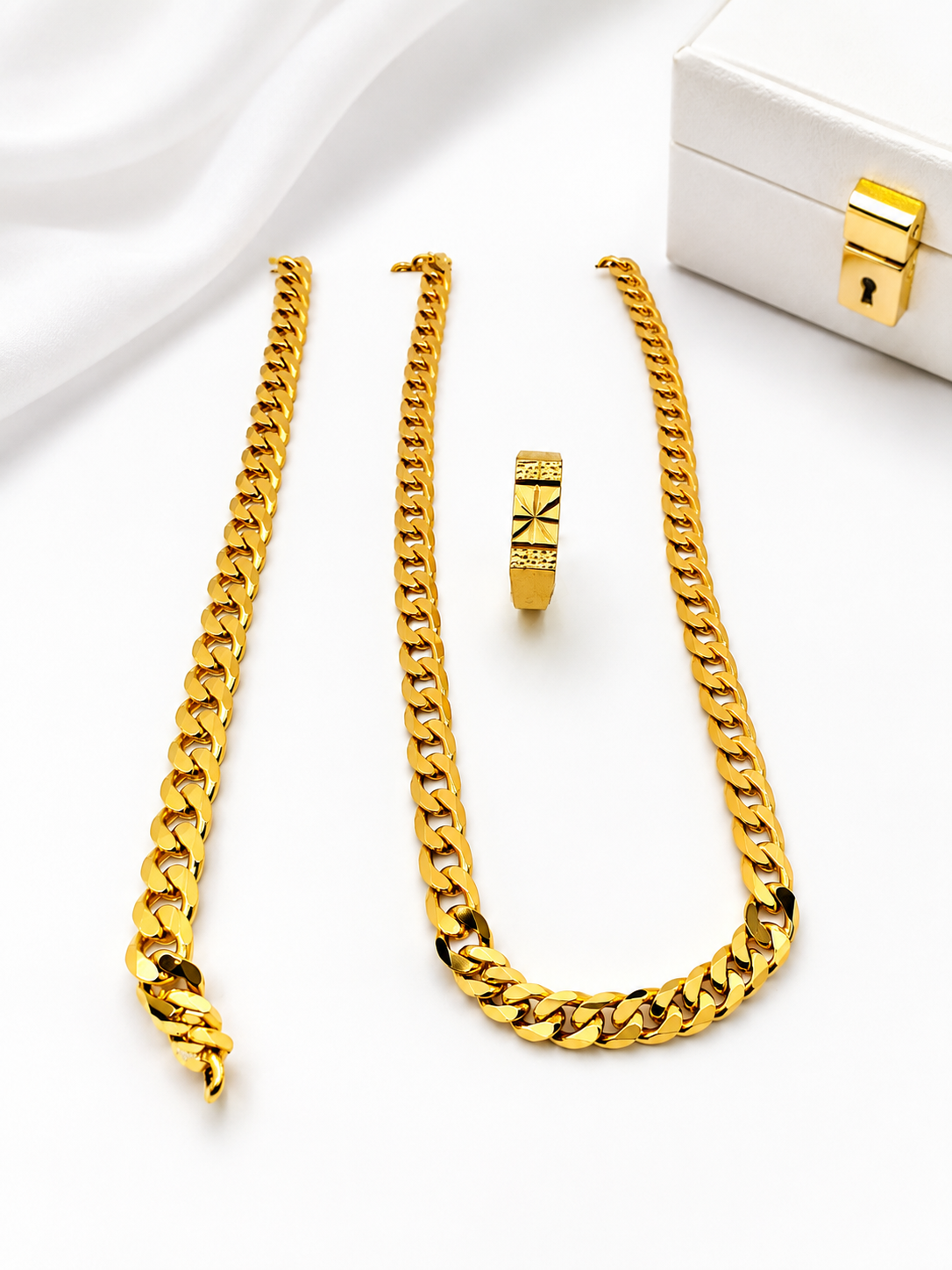 Upgrade your style with our Premium 24K Gold Plated Cuban Chain & Ring Combo Set, designed for men who appreciate luxury and elegance. Crafted on a high-quality copper base and finished with premium 24K gold plating, this set offers the rich appearance of real gold with excellent durability and long-lasting shine.