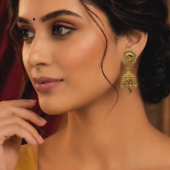 Elegant Double-Layer Jhumka Design
✔ Premium Gold-Plated Finish
✔ Intricate Traditional Craftsmanship
✔ Lightweight for All-Day Comfort
✔ Perfect for Festivals & Weddings
✔ Stylish Floral Stud Pattern
✔ Complements Traditional & Modern Outfits