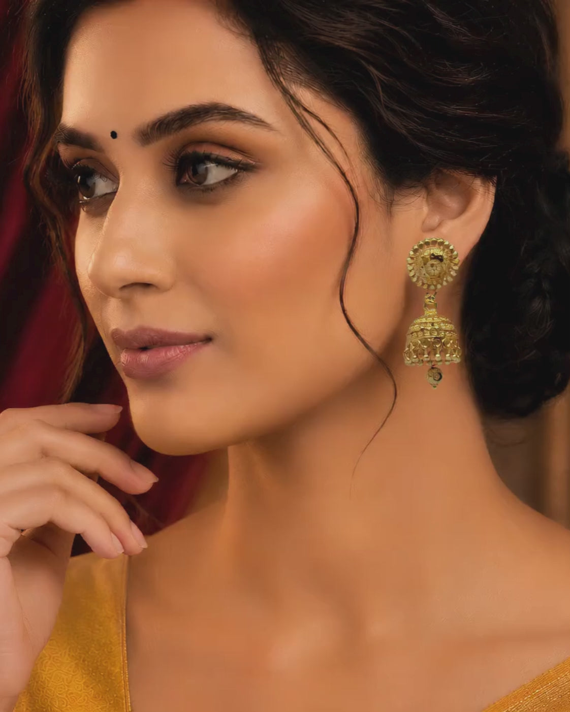 Elegant Double-Layer Jhumka Design
✔ Premium Gold-Plated Finish
✔ Intricate Traditional Craftsmanship
✔ Lightweight for All-Day Comfort
✔ Perfect for Festivals & Weddings
✔ Stylish Floral Stud Pattern
✔ Complements Traditional & Modern Outfits